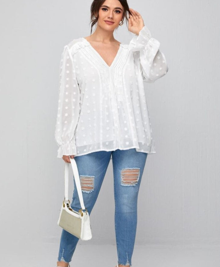 Blusa con manga con volante plisada y lunares suizos