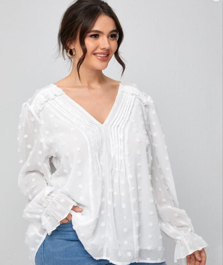 Blusa con manga con volante plisada y lunares suizos