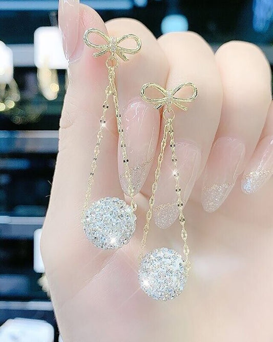 Pendientes colgantes con diamantes de imitación y patrón de bolas con lazo