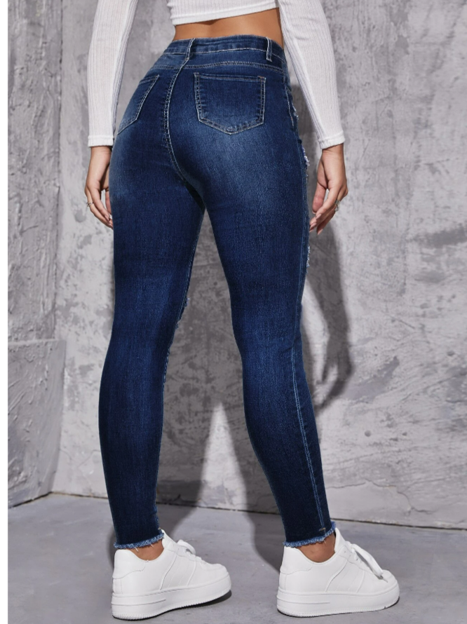 Ripped Raw Trim Skinny Jeans